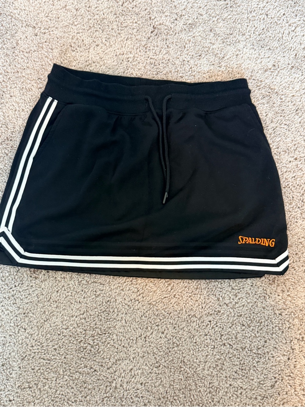 Spalding Black Mini Skirt with White Stripes and Orange Logo